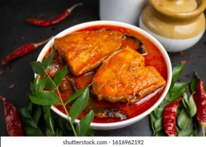 An image of Spicy Pangus Curry (Bangladeshi Pangas Recipe)